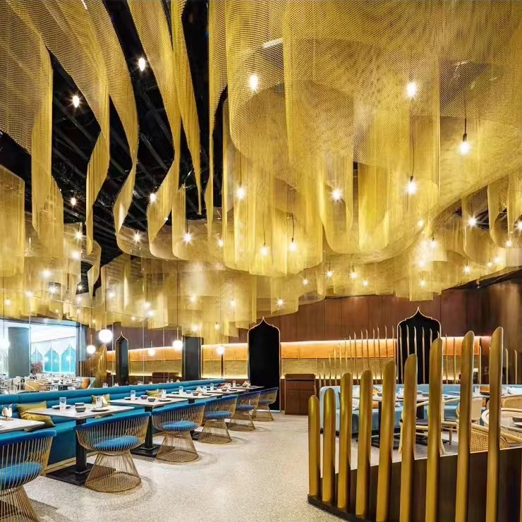 Bespoke metal fringe ceiling decorative installation by NEXTOP in a luxury restaurant