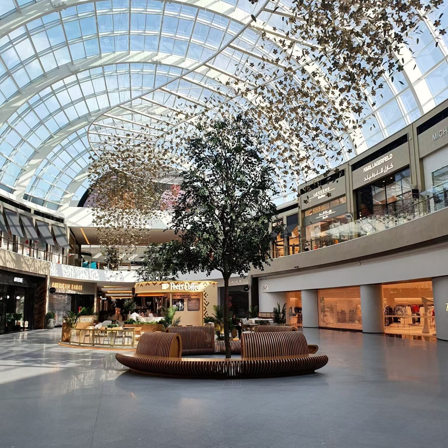Custom metal fringe ceiling installation by NEXTOP in a flagship luxury store