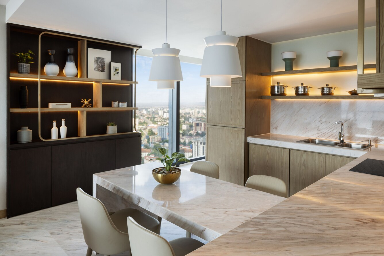 Tailor-made kitchen and cabinetry by NEXTOP in a hotel suite